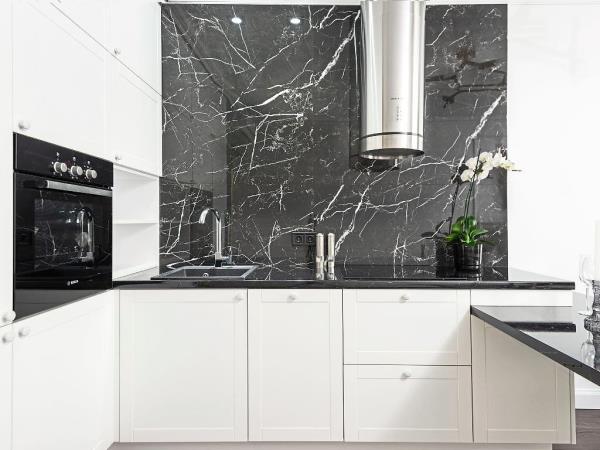 A granite countertop resists scratches, stains, is heat-resistant and does not chip easily.