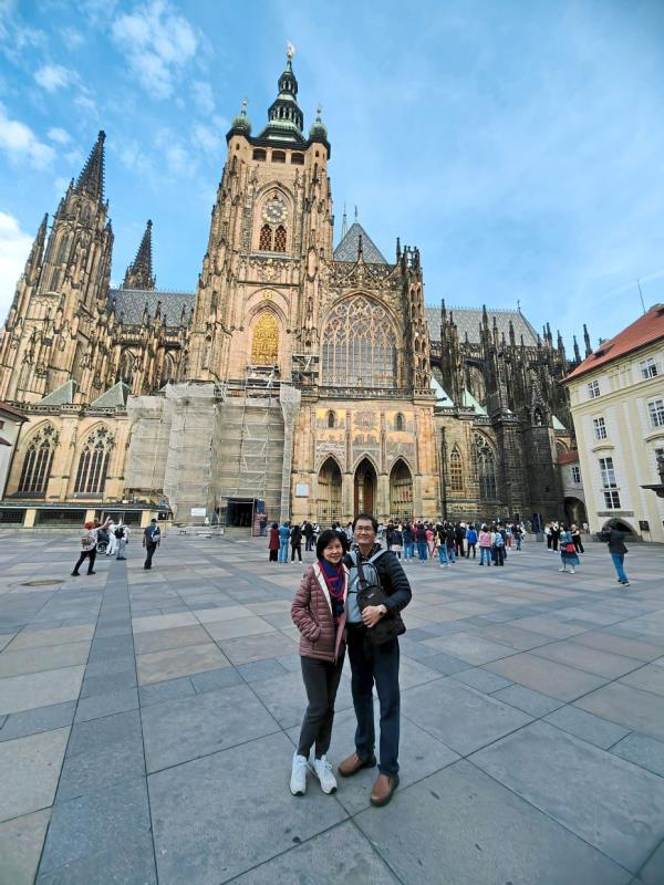 The writer (left) in front of the Prague Castle, one of the oldest castles in the world.